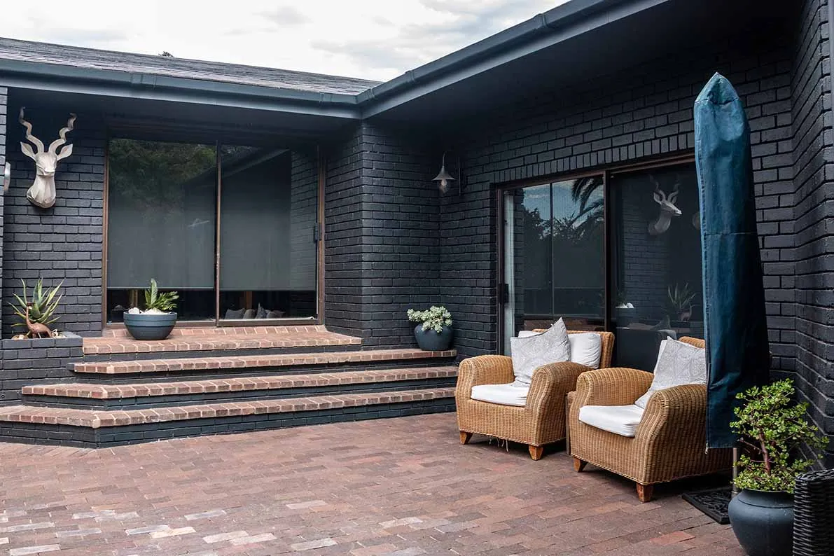 Completed courtyard and outdoor living space at Renov8’s Aurora renovation
