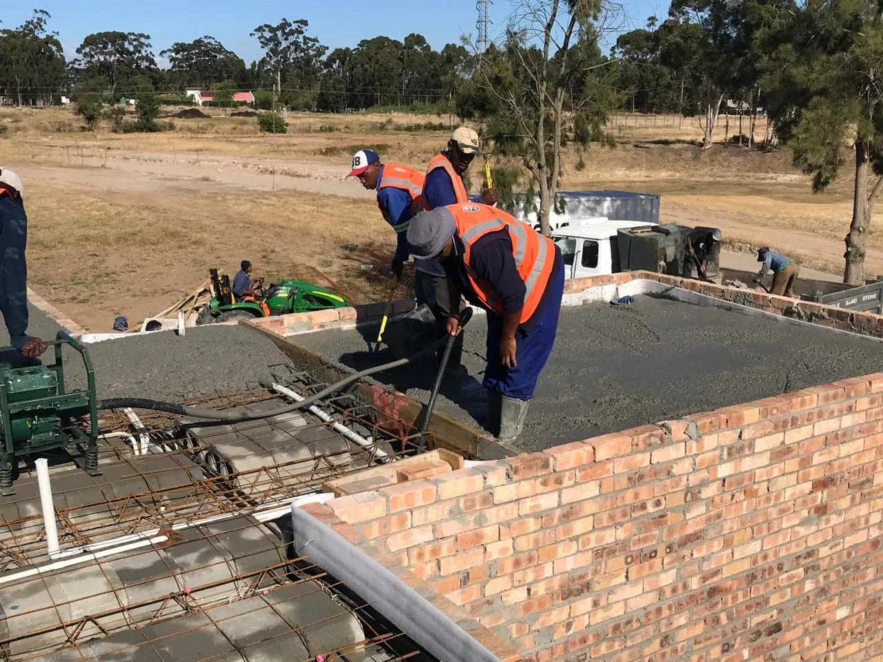 Renov8 team vibrating and levelling the first-floor slab